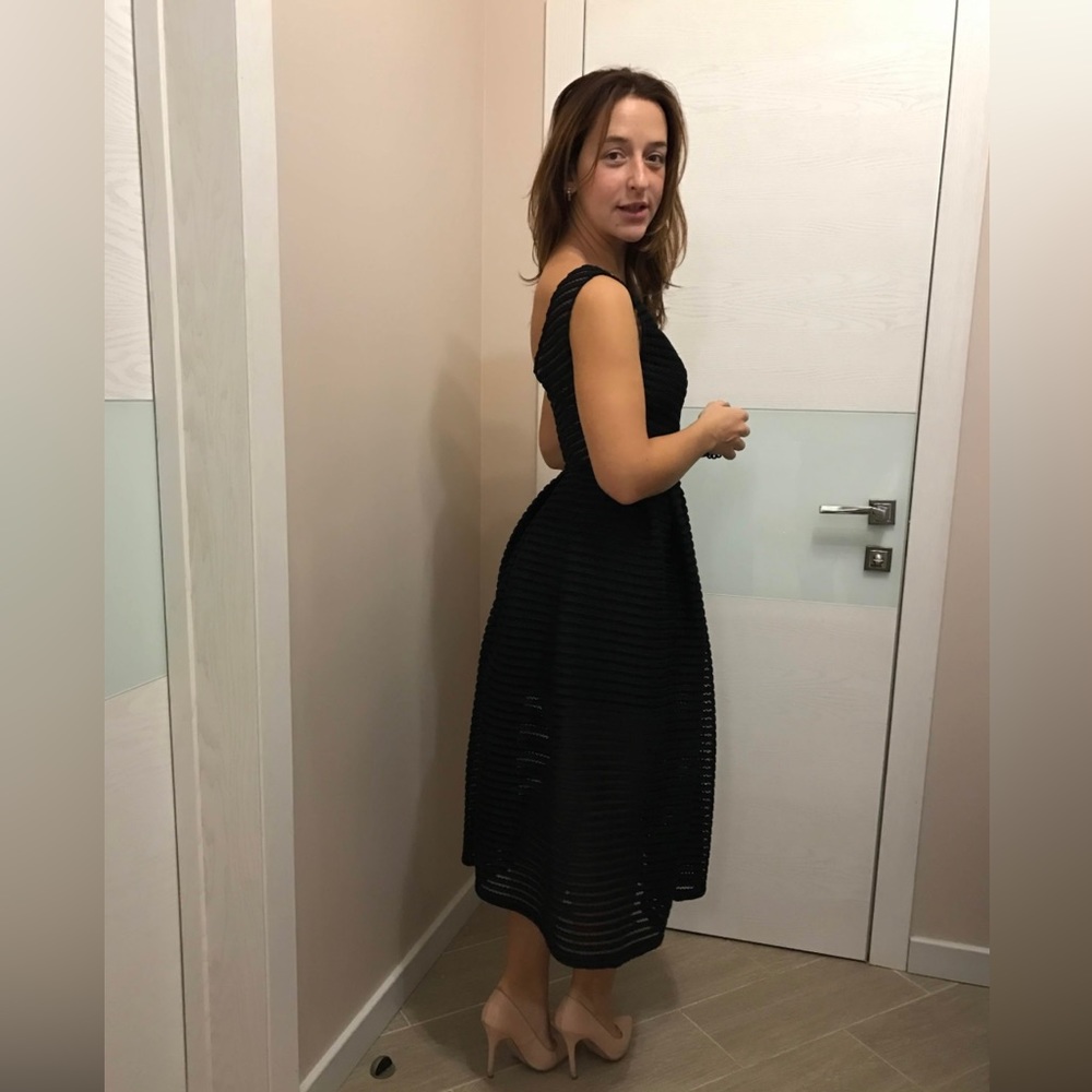 This dress is  from Ukrainian designer ROUSSIN🌟